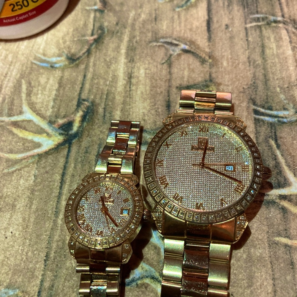 Matching (husband/wife) Croton real diamond watches. These are not real gold!